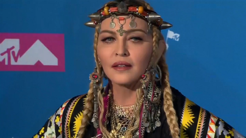 WATCH: Madonna responds to butt implant speculation | W24