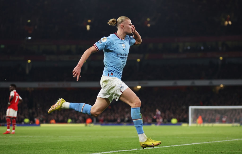 Erling Haaland of Manchester City celebrates after scoring the teams third goal during the Premier League match between Arsenal FC and Manchester City at Emirates Stadium on February 15, 2023 in London, England. (Photo by Julian Finney/Getty Images)
