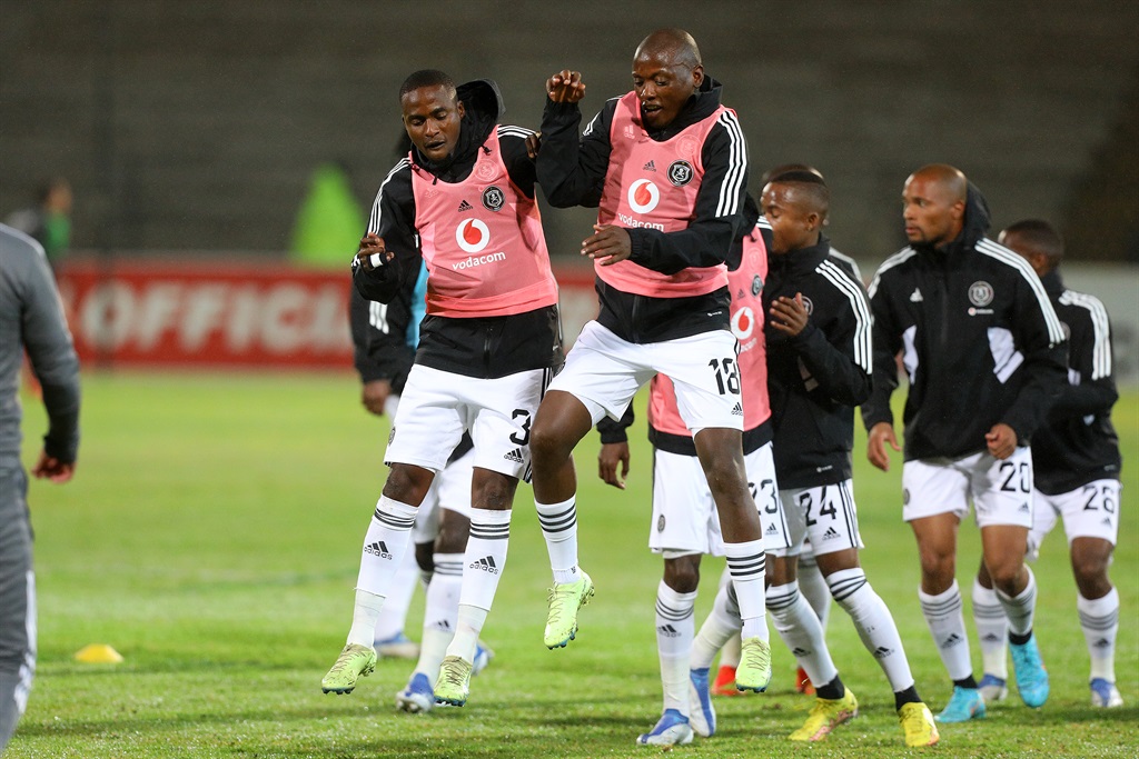 Orlando Pirates players warm up ahead of a DStv Premiership match. 