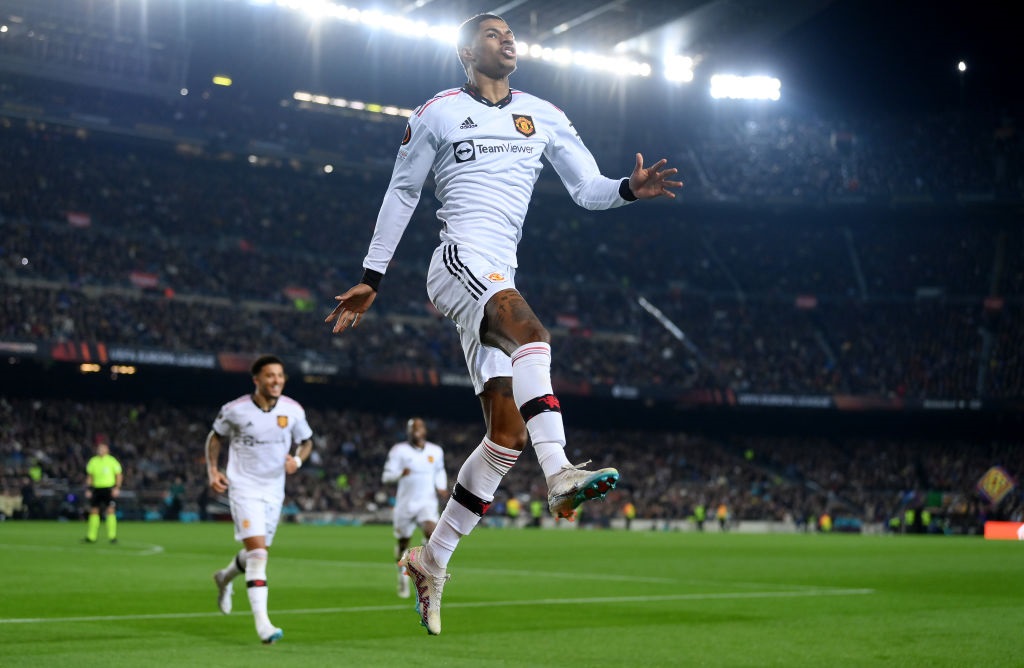 BARCELONA, SPAIN - FEBRUARY 16: Marcus Rashford of Manchester United celebrates an own goal by Jules Kounde of FC Barcelona (not pictured), Manchester Uniteds second goal during the UEFA Europa League knockout round play-off leg one match between FC Barcelona and Manchester United at Spotify Camp Nou on February 16, 2023 in Barcelona, Spain. (Photo by David Ramos/Getty Images)