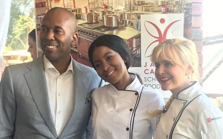 Anele Tembe (centre) is pictured with her father, Moses, and Jackie Cameron, during her time at the Jackie Cameron School of Food and Wine.