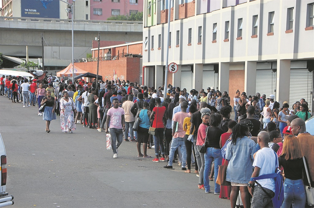The students standing outside Steve Biko campus at DUT to register for 2019 academic year. Photo by Phumlani Thabethe