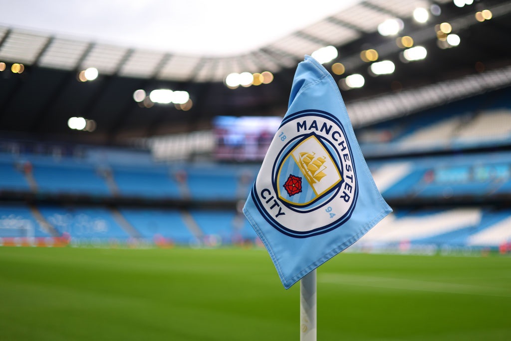 MANCHESTER, ENGLAND - SEPTEMBER 19: Manchester City corner flag with a logo / badge on during the UEFA Champions League match between Manchester City and FK Crvena Zvezda at Etihad Stadium on September 19, 2023 in Manchester, England. (Photo by Robbie Jay Barratt - AMA/Getty Images)