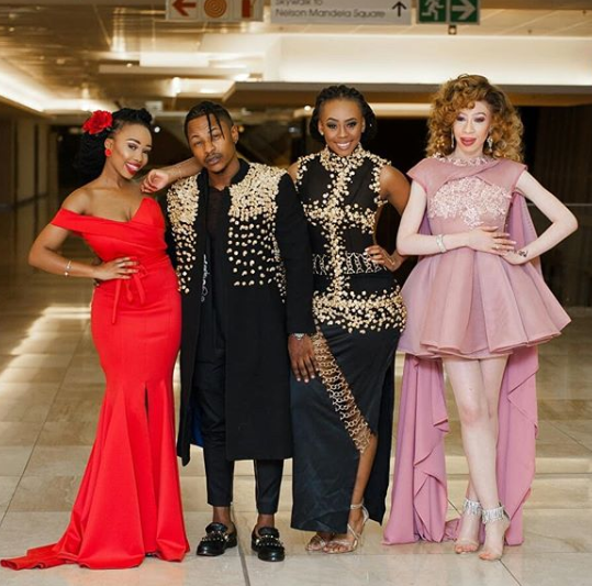 The Modiselle sisters, Candice, Bontle and Refilwe pose with rapper, Priddy Ugly.
Photo: Instagram