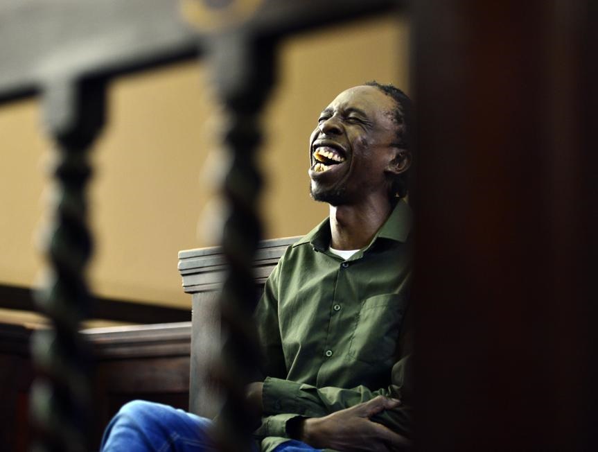 Pitch Black Afro appeared to be in rather good spirits during a court appearance over his wife’s murder.  Photo by Trevor Kunene