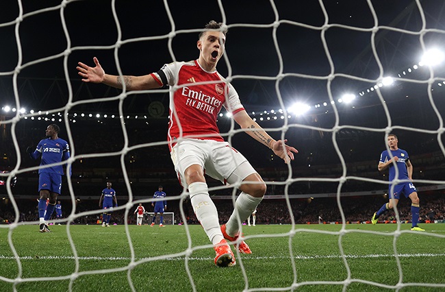 Arsenal's Leandro Trossard celebrates a Kai Havertz goal during the Premier League match against Chelsea at the Emirates Stadium in London on 23 April 2024. (Julian Finney/Getty Images)