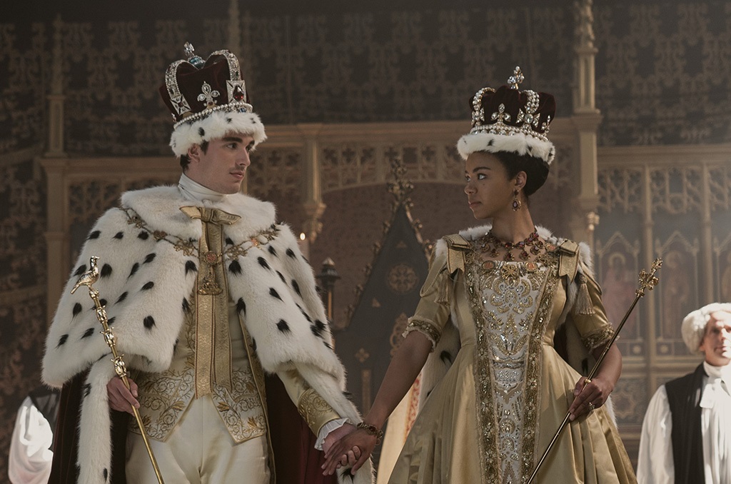 India Amarteifio as Young Queen Charlotte and Corey Mylchreest as Young King George in Queen Charlotte: A Bridgerton Story.