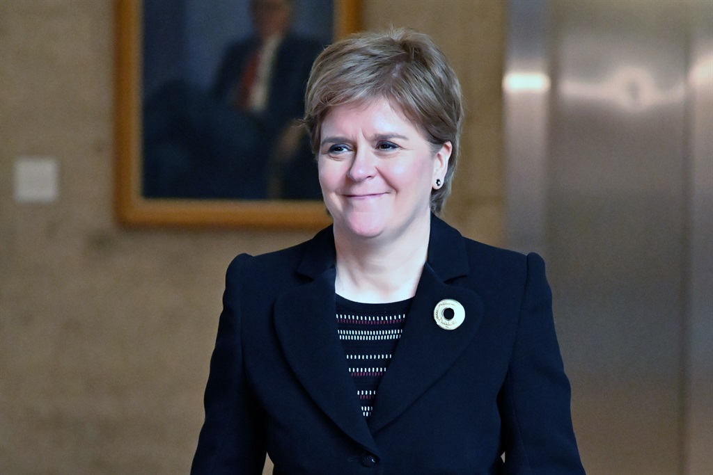 First Minister and SNP leader Nicola Sturgeon smiles on her way to a meeting of the SNP group in the Scottish Parliament, following her recent sudden resignation from the posts, resulting in an unexpected SNP leadership election, on February 21, 2023 in Edinburgh, Scotland. (Photo by Ken Jack/Getty Images)