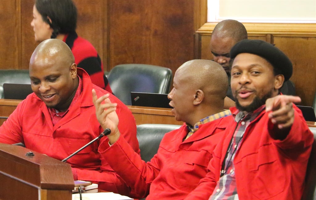 EFF MP's Floyd Shivambu, Julius Malema and Mbuyiseni Ndlozi at Thursday's meeting of the Joint Constitutional Review Committee where a recommendation was adopted to allow expropriation without compensation. (Jan Gerber/ News24)