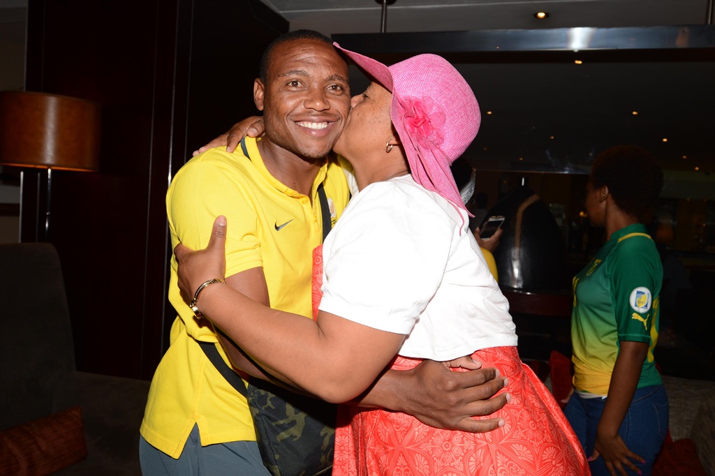 JOHANNESBURG, SOUTH AFRICA - JANUARY 07, Bafana Bafana player Thuso Phala meets his Mother Suzan during the South African national soccer team departure Press Conference at Southern Sun Hotel, OR Tambo International Airport on January 07, 2015 in Johannesburg, South Africa. (Photo by Lefty Shivambu/Gallo Images)
