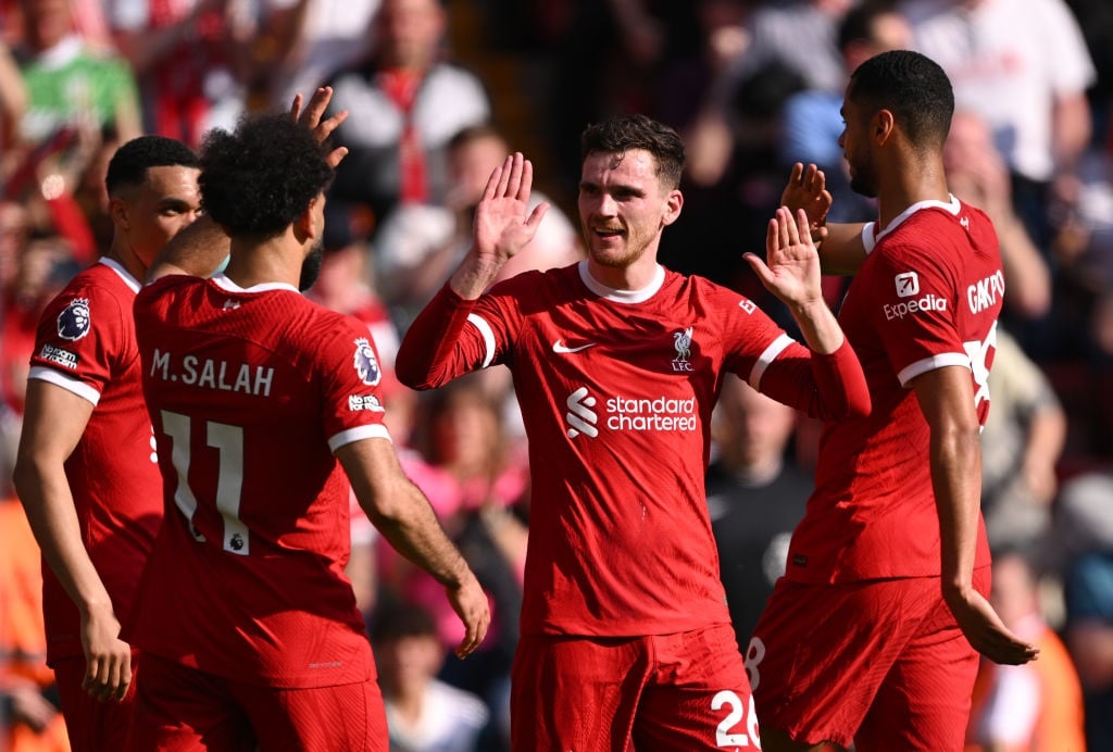 LIVERPOOL, ENGLAND - MAY 05: Andrew Robertson of Liverpool celebrates scoring his teams first goal with teammate Mohamed Salah during the Premier League match between Liverpool FC and Tottenham Hotspur at Anfield on May 05, 2024 in Liverpool, England. (Photo by Stu Forster/Getty Images)