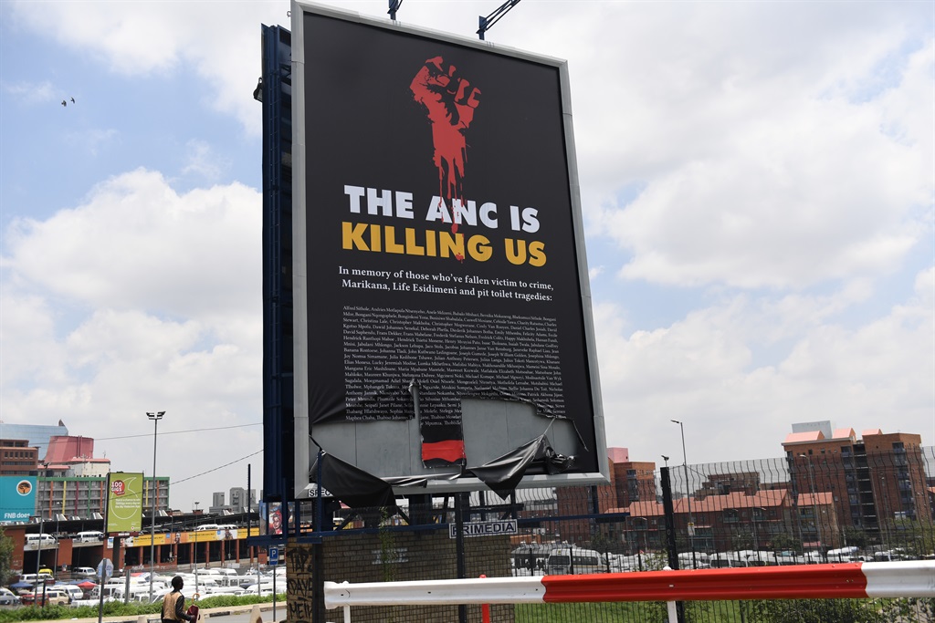 The billboard that had the names of victims of the Marikana Massacre, children who died in pit toilets and the victims of the Life Esidimeni Tragedy was vandalised soon after it was unveiled. Picture: Felix Dlangamandla/Netwerk24 