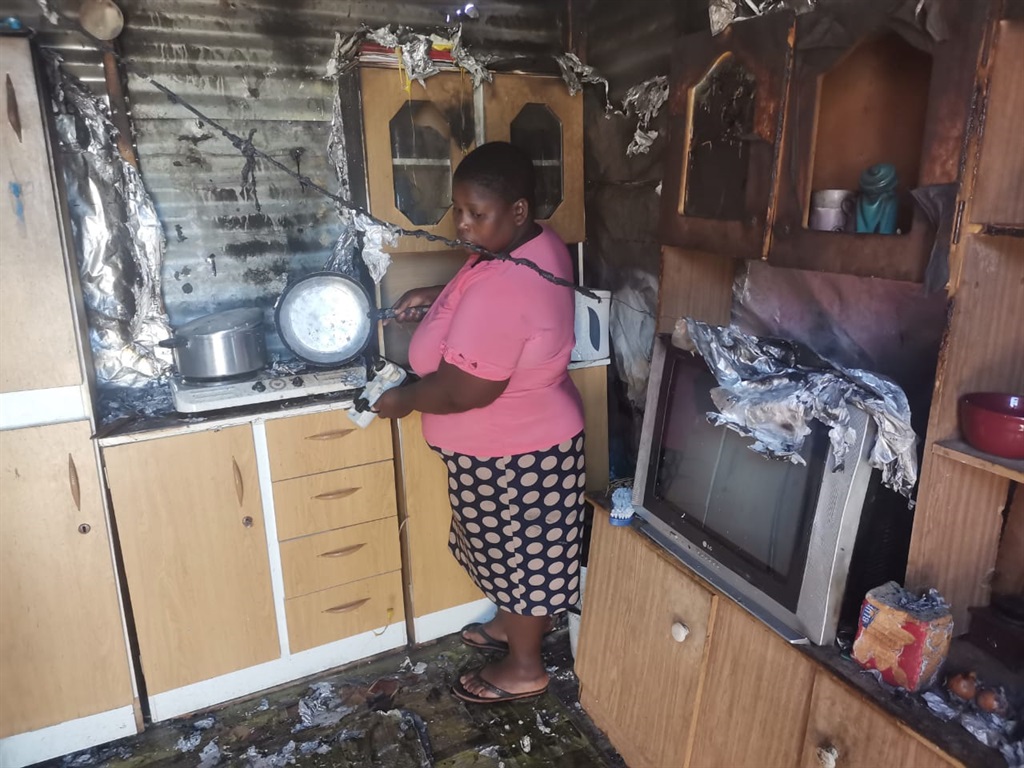 Snethemba Dlulisa believes the fire was caused by vutha. Photo by Lulekwa Mbadamane 