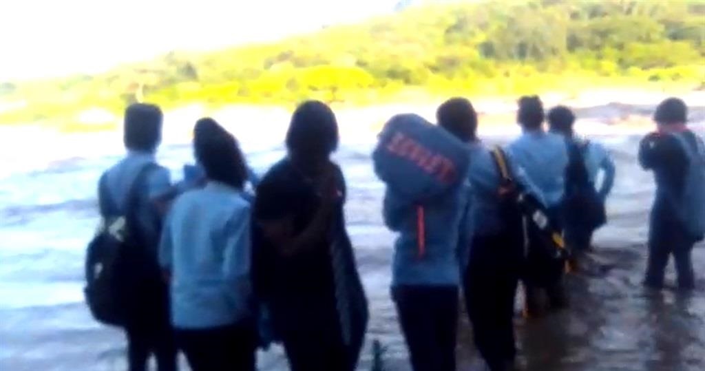 WATCH: River stops pupils from schooling!