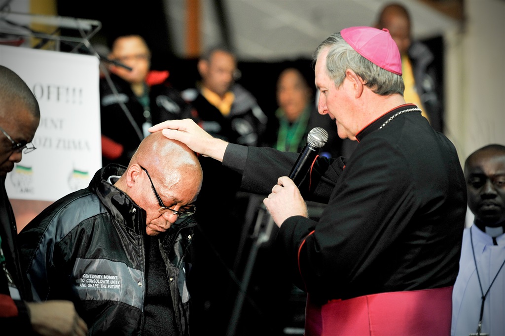 A priest praying for Jacob Zuma at the Free State provincial conference on 24 June 2012 in Parys. (Photo by Gallo Images / Foto24 / Lerato Maduna)