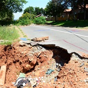 WATCH: Sinkholes continue to swallow suburb!