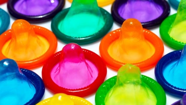 Practising safe sex with condoms