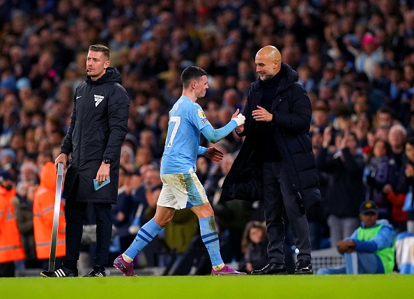 Pep Guardiola says Manchester City's Phil Foden can still improve his understanding of the game. 