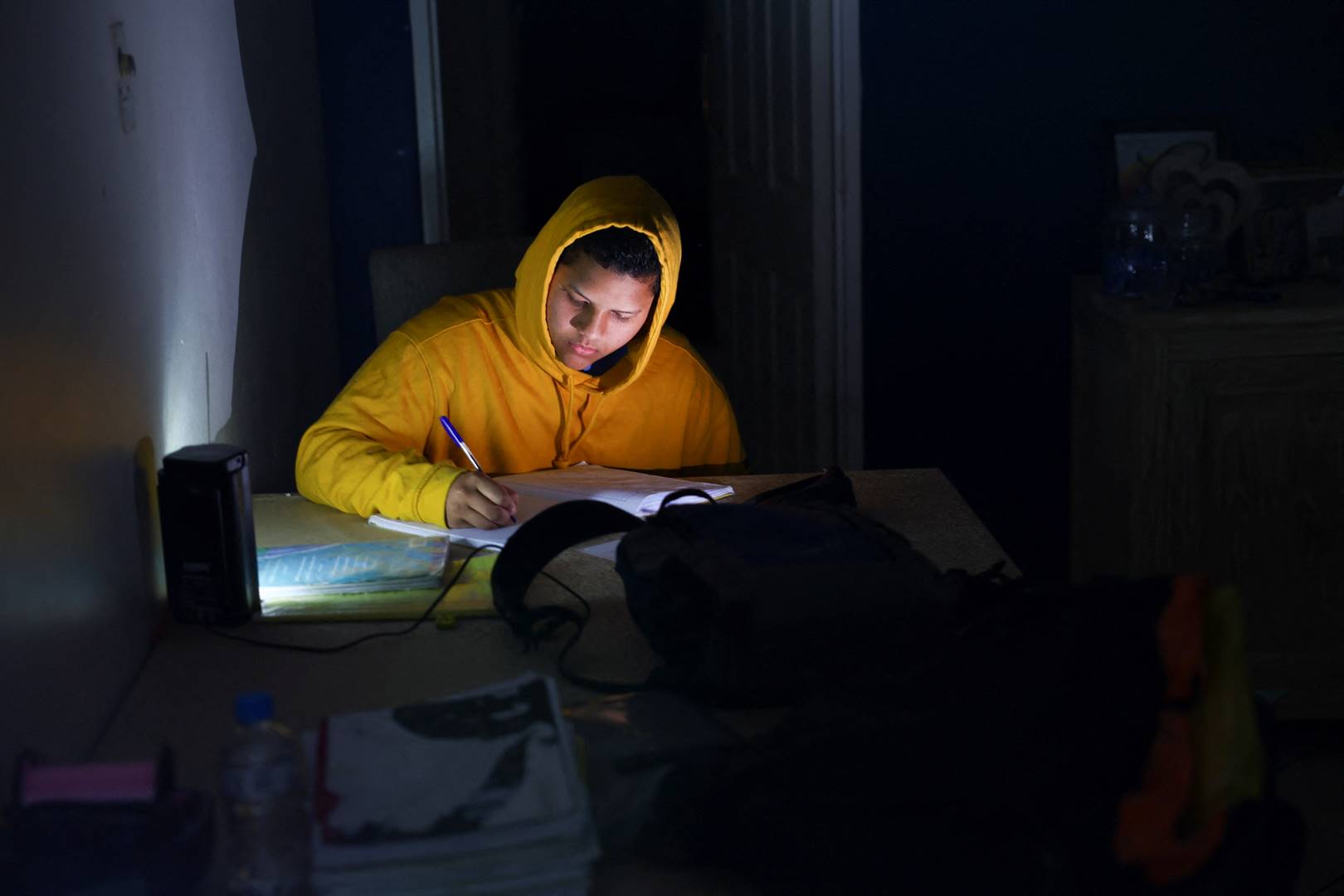 Ismail Sha studies with a rechargeable lantern for his final exams during load shedding towards the end of last year. Much like the power crisis, literacy among grade 4 and 5 pupils in the country is atrociously bad. 