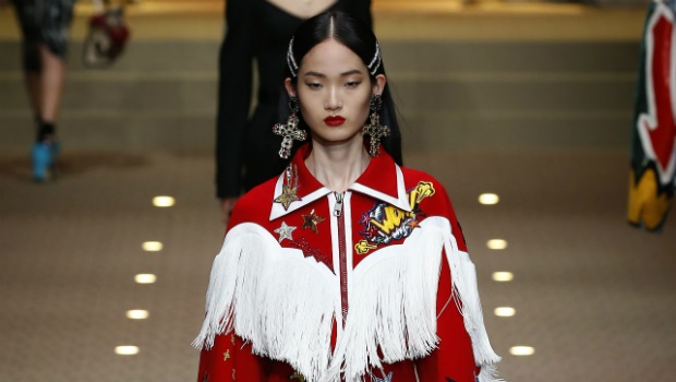 An Asian model walks the runway at the Dolce & Gabbana show during Milan Fashion Week