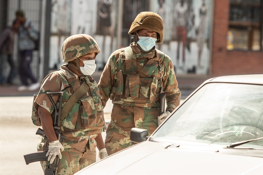 SANDF patrolling the streets. (Photo by Gallo Images/Misha Jordaan)