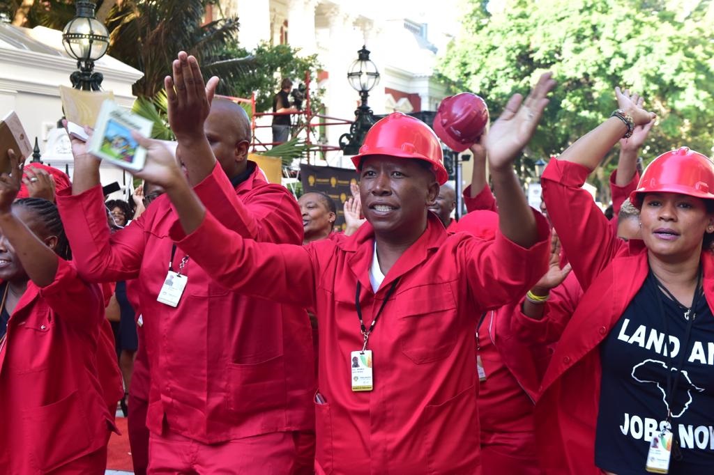 Economic Freedom Fighters members in song and dance as they walk on the SONA red carpet. Picture: Parliment SA