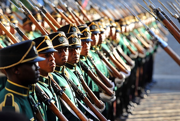 CAPE TOWN, SOUTH AFRICA - FEBRUARY 07: Soldiers performing the 21 Gun Salute during the arrival of President Cyril Ramaphosa at the State of the Nation Address 2019 in Cape Town, South Africa. This was President Cyril Ramaphosas first time delivering the address. (Photo by Gallo Images/ Ziyaad Douglas)