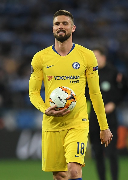 Hat trick scorer Olivier Giroud of Chelsea celebrates with the match ball after the UEFA Europa League Round of 16 Second Leg match between Dynamo Kyiv and Chelsea at NSC Olimpiyskiy Stadium 