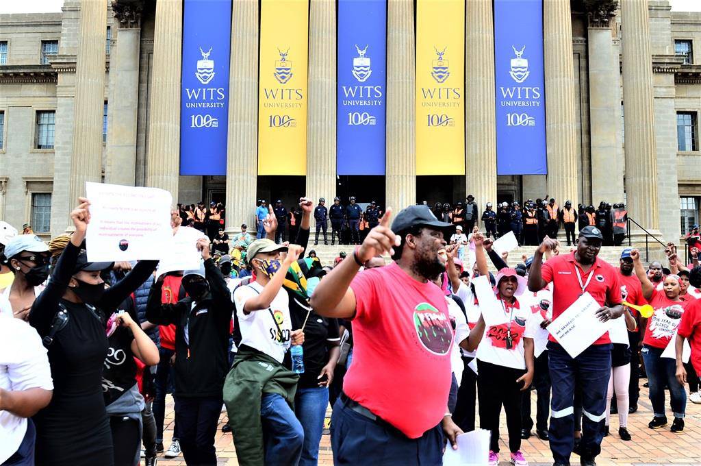 Students and staff protest at the University of Witwatersrand in Johannesburg on Monday.