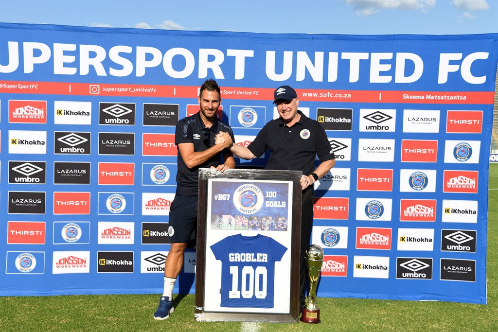 PRETORIA, SOUTH AFRICA - MARCH 05:  SuperSport United CEO Stan Matthews and Bradley Grobler celebrates his 100 goals. 