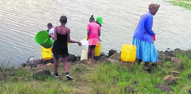 Machibini residents have to collect water from a dam in the area.