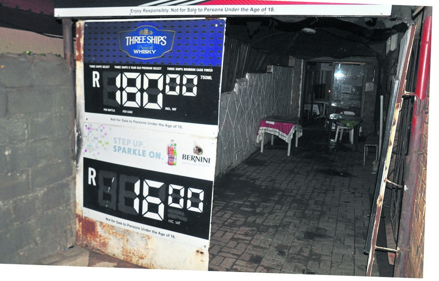 Three guests were allegedly electrocuted after touching the tavern gate (right).