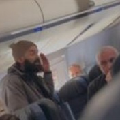 WATCH | Man tries to open jet’s door on packed flight