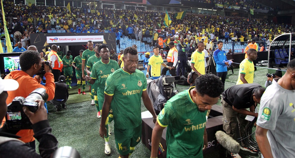 Officials and players walking to the field during the CAF Champions League match between Mamelodi Sundowns and Young Africans SC at Loftus Versfeld Stadium on April 05, 2024 in Pretoria, South Africa. 