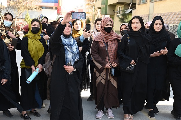 Afghan women stage a protest for their rights to mark International Womens Day, in Kabul, on Wednesday. 