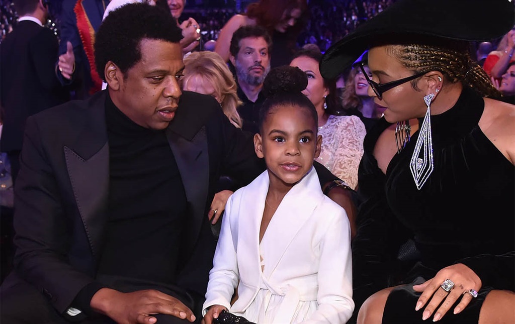 Blue Ivy Carter with her parents Beyoncé and Jay Z at the 60th Annual GRAMMY Awards