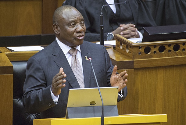 President Cyril Ramaphosa gestures as he delivers his annual State of the Nation address, in the South African Parliament, on February 7, 2019, in Cape Town. (Photo by Rodger BOSCH / AFP)