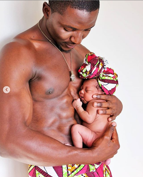 Actor, Joe Kazadi and his new-born daughter.