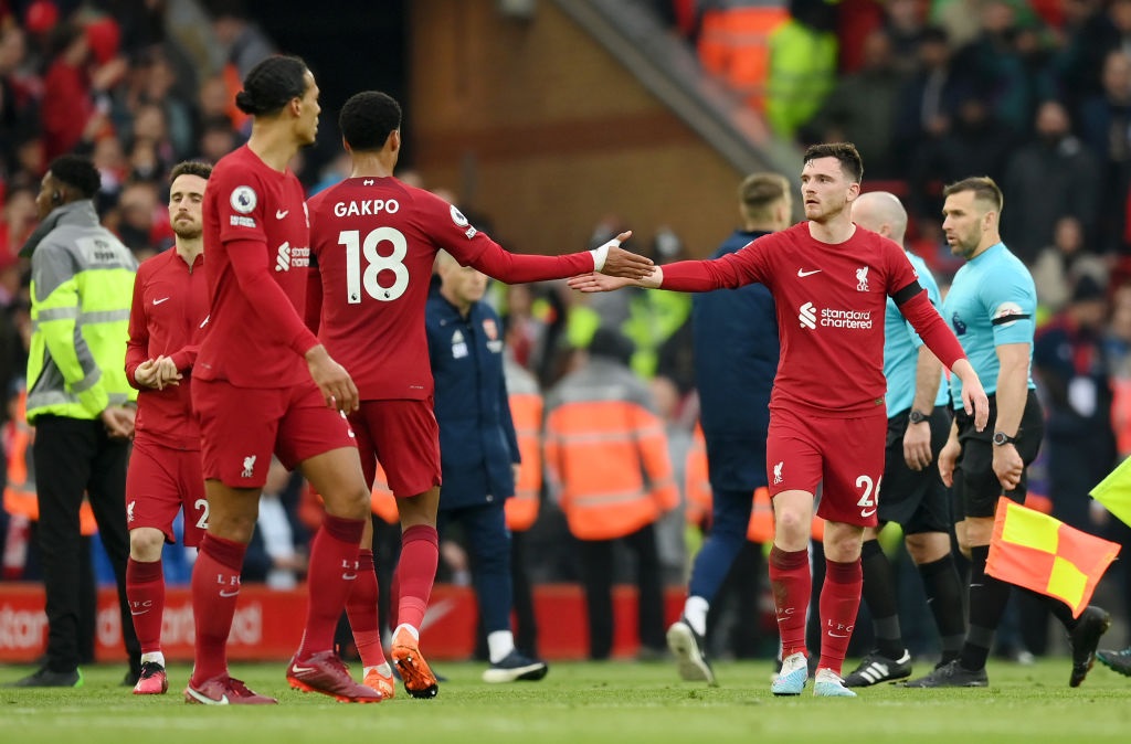 Cody Gakpo shakes hands with Andrew Robertson of Liverpool (Photo by Shaun Botterill/Getty Images)