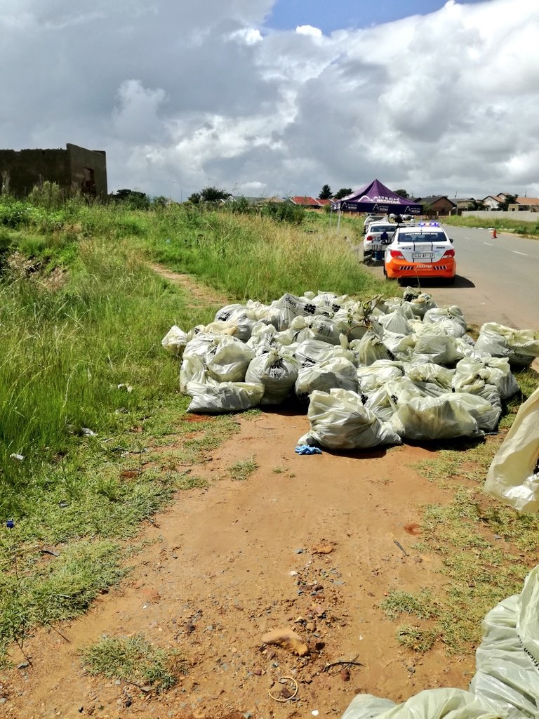 Resident cleaning Lenasia South dumpsites and turn