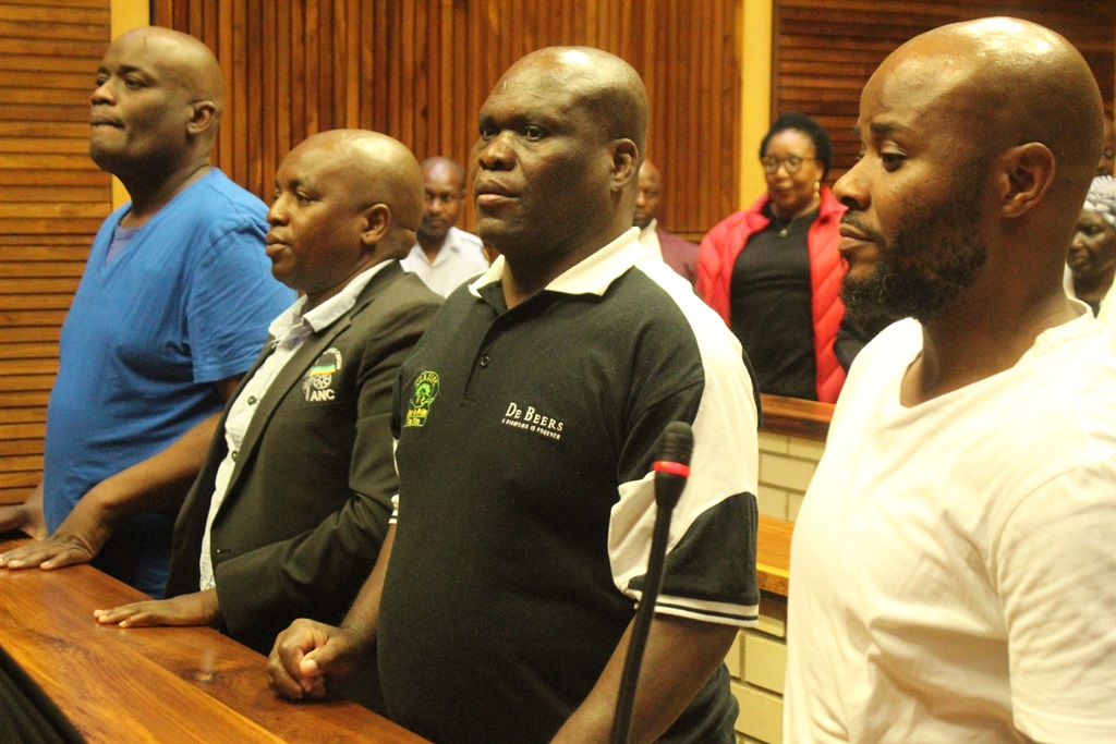 From left: Sipho Mkhatshwa, Philemon Lukhele, Mduduzi Gama and Rassie Nkune are standing trial for the murder of Hillary Gardee at the Mpumalanga Division of the High Court in Mbombela. Photo by Bulelwa Ginindza