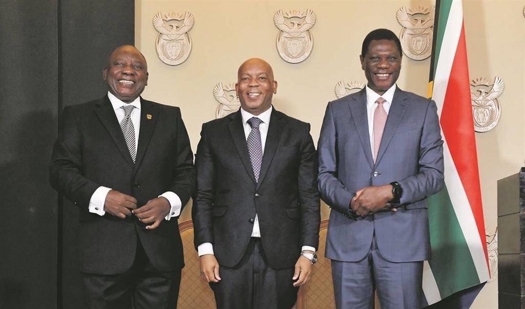 Electricity Minister Kgosientso ‘Sputla’ Ramokgopa (centre) with President Cyril Ramaphosa and Deputy President Paul Mashatile after being sworn in as part of the national executive this week.