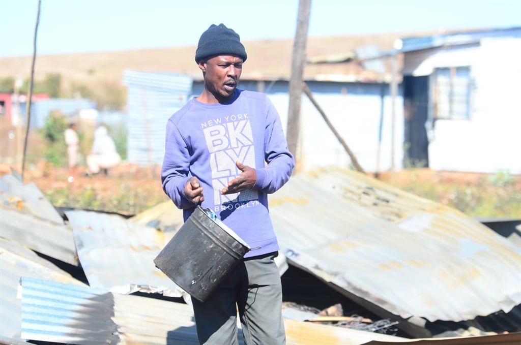 Edwin Meso said his neighbour allegedly set his set his shack on fire on Friday. Photo by Raymond Morare 