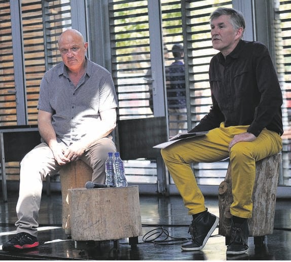 Photojournalist, film maker and member of the Bang Bang Club Greg Marinovich (left) talks to artist Karel Nel at the launch of The Dead Zone exhibition at Constitution Hill. Picture: Rosetta Msimango