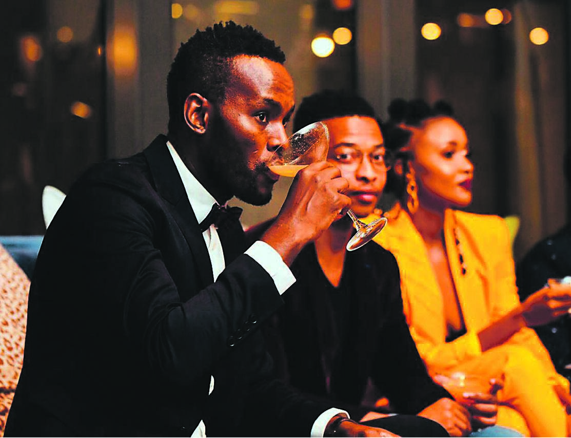 SIPPING PRETTY Rémy Martin ambassador Madoda Khuzwayo and actor Oros Mampofu