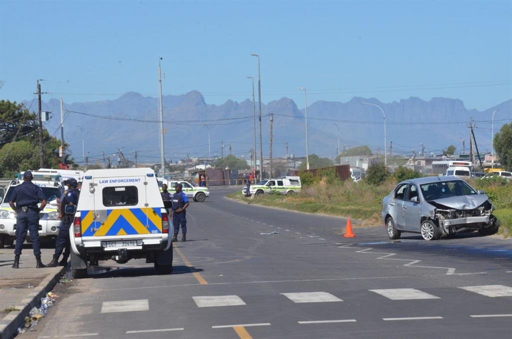 Three men who fired shots at cops while in a suspected stolen vehicle were arrested on Govan Mbeki Road in Philippi East on Sunday. Photo by Lulekwa Mbadamane