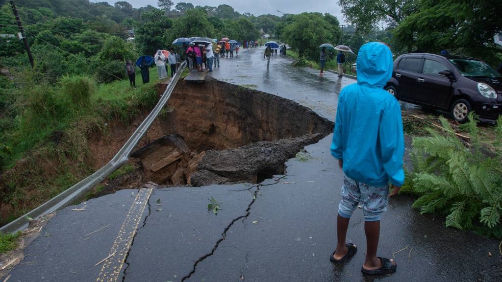 A collapsed road caused by flooding as a result of heavy rains following Cyclone Freddy in Blantyre, Malawi.