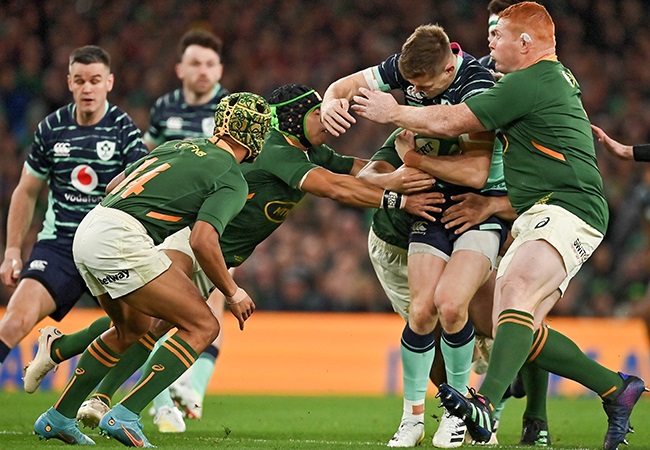 Ireland’s Garry Ringrose is tackled by Springbok trio Kurt-Lee Arendse, Cheslin Kolbe and Steven Kitshoff in a Test in Dublin on 5 November 2022. (Photo by Brendan Moran/Sportsfile/Gallo Images)