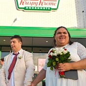 'I dough': Couple with cerebral palsy weds at Krispy Kreme after winning wedding competition