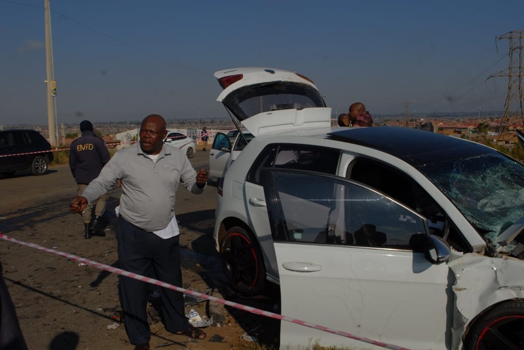 Delly Ntweng at the accident scene involving his son, Sibusiso. Photo by Phineas Khoza